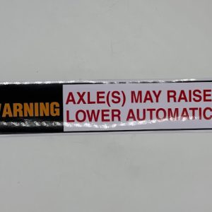 Axle may raise or lower automatically sticker