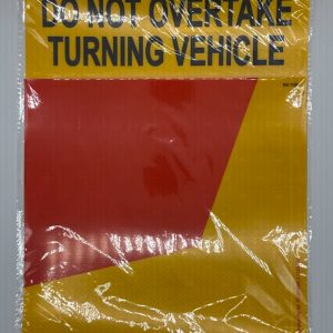 Do not overtake turning vehicle sticker